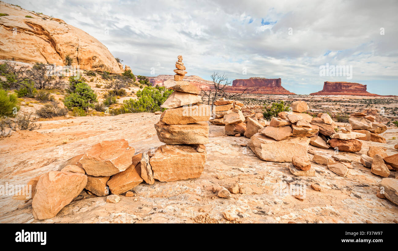 Trail stone footpath marking in Canyonlands National Park at sunset, Island in the Sky district, Utah, USA. Stock Photo