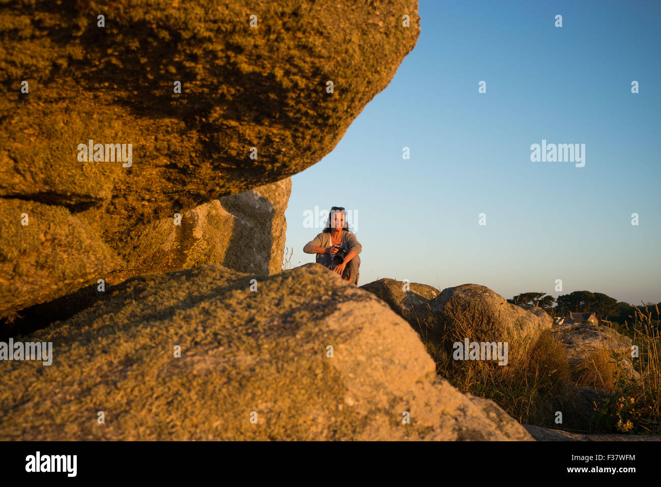 Senior with a camera. Stock Photo