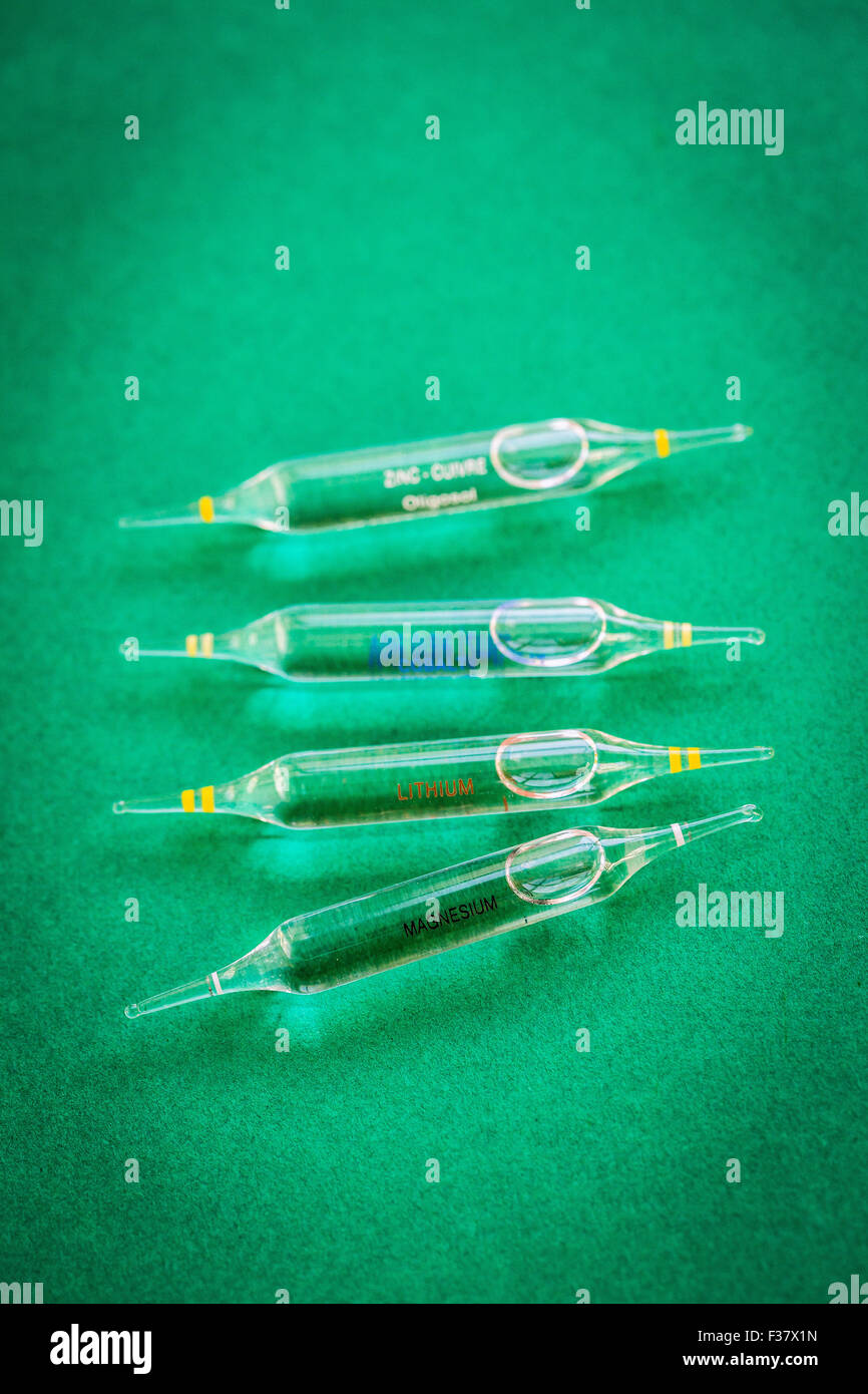 Glass ampoules of various trace elements. Stock Photo