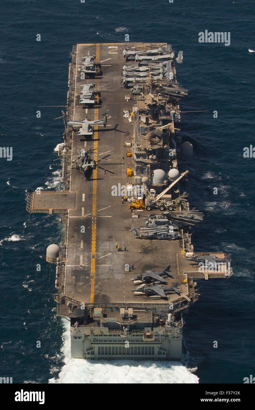 U.S. Navy Wasp-class amphibious assault ship USS Essex underway September 24, 2015 in the Arabian Gulf. Stock Photo
