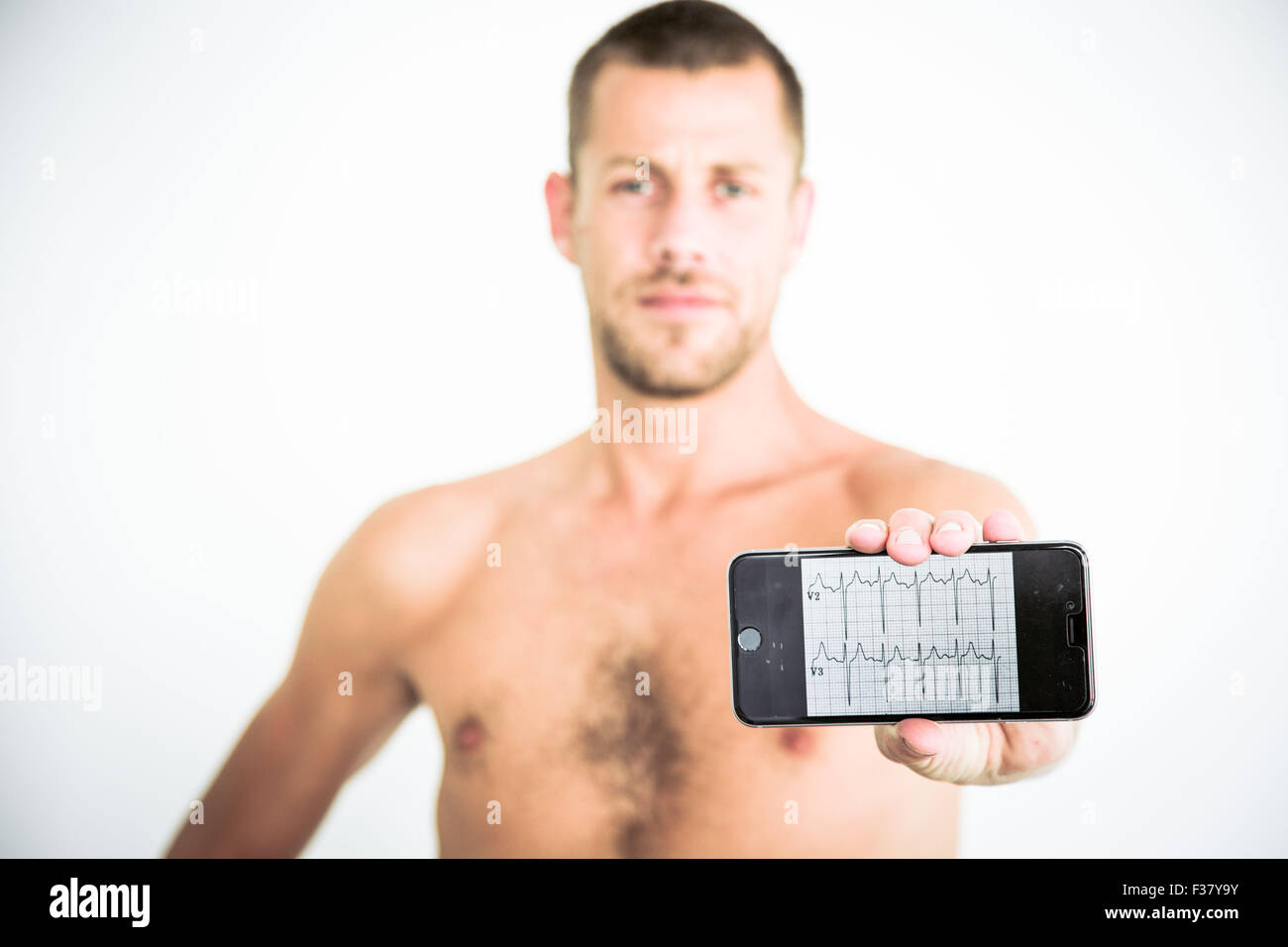 Man using health application on his Iphone. Stock Photo
