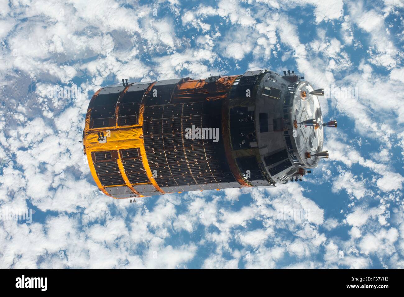 The Canadarm 2 releases the Japan Aerospace Exploration Agency Kounotori 5 H-II Transfer Vehicle cargo spacecraft departs the International Space Station September 29, 2015 in Earth Orbit. The automated cargo craft, named Kounotori, or white stork, was berthed to the orbiting laboratory for five weeks and delivered almost five tons of hardware and supplies. Stock Photo