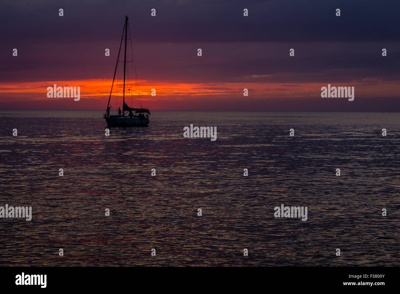 beautiful landscape with sunset over sea with dramatic sky Stock Photo