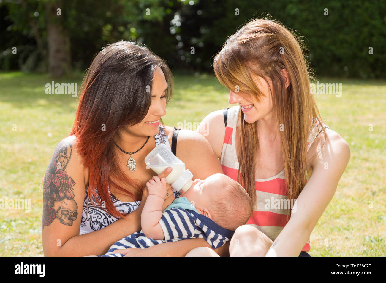 Lesbian couple with their baby Stock Photo