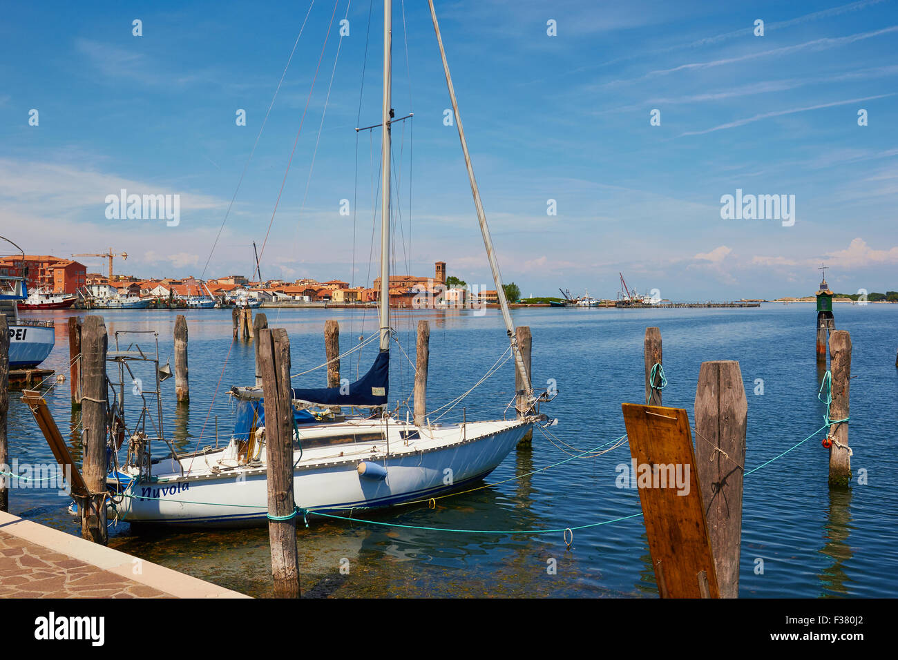 Yacht moored on the Venetian lagoon island of Chioggia Veneto Italy Europe Stock Photo