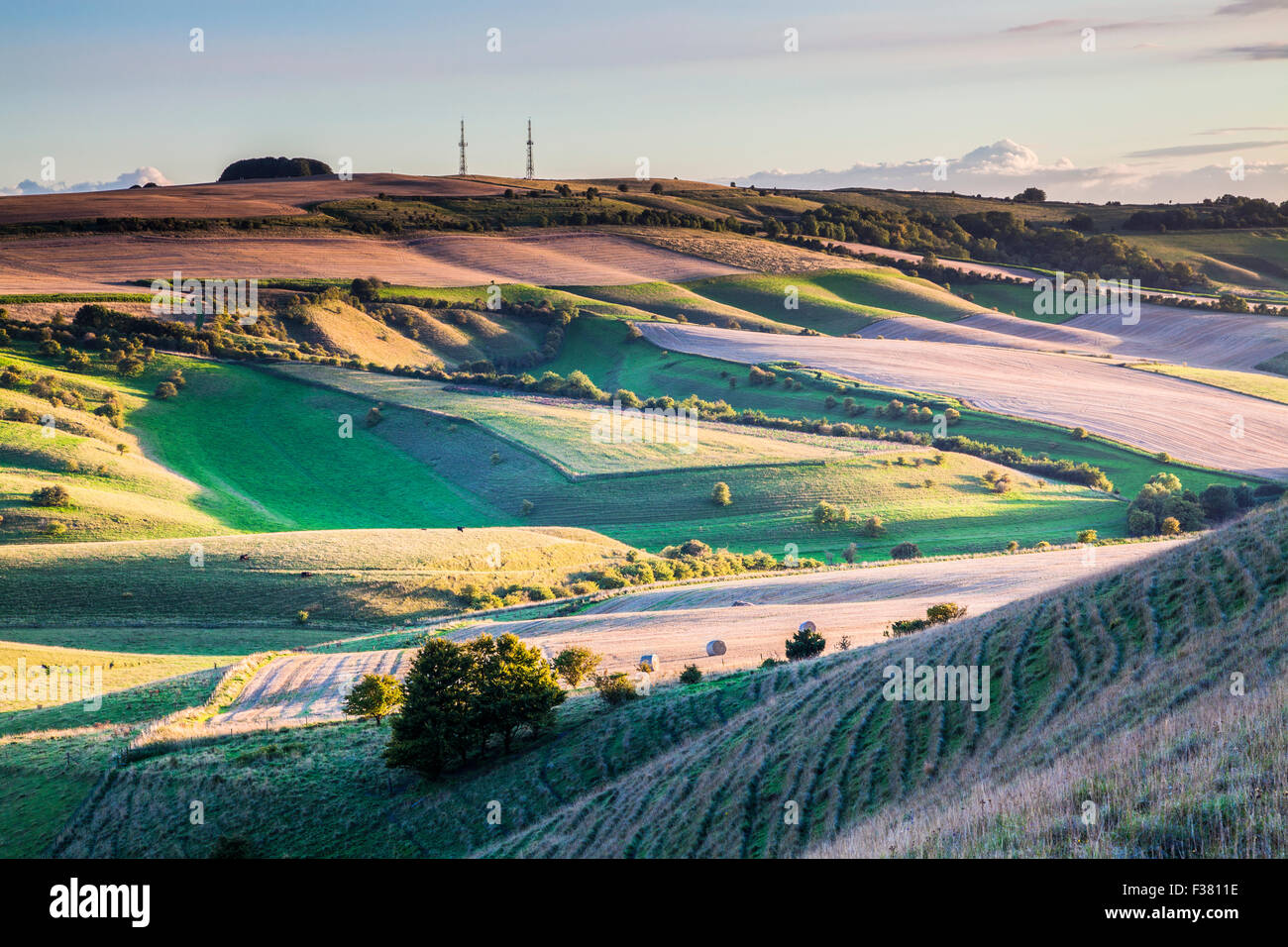 Evening light over the Wiltshire countryside towards Morgan's Hill. Stock Photo