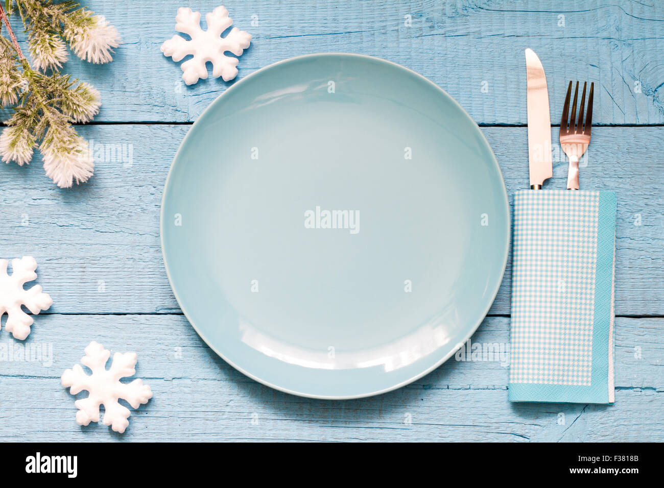 Christmas table and empty plate background concept blue Stock Photo