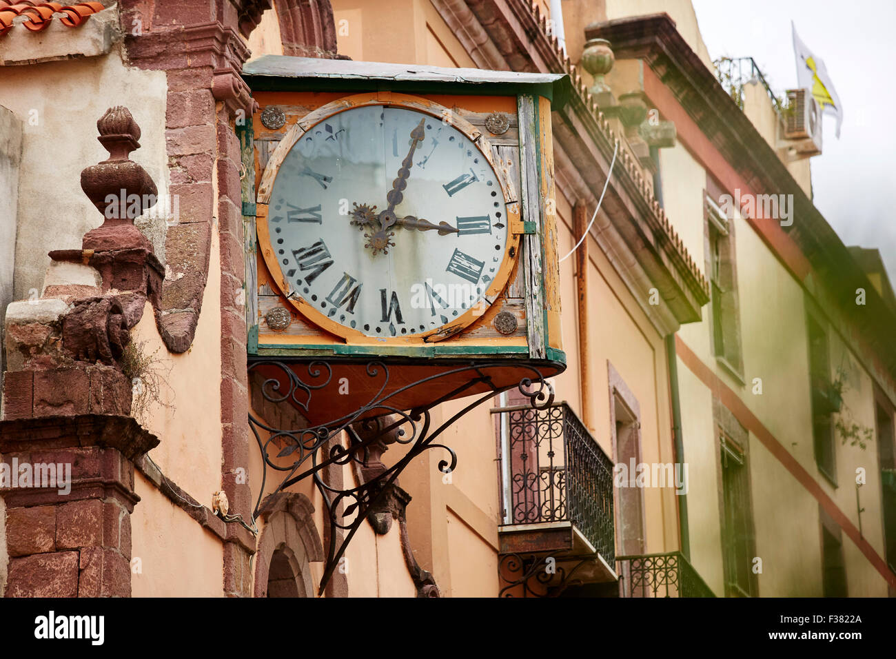 Old clock face in Bosa, Sardinia Stock Photo