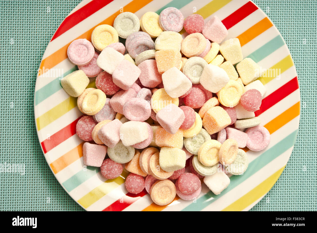 colorful candies on a plate Stock Photo