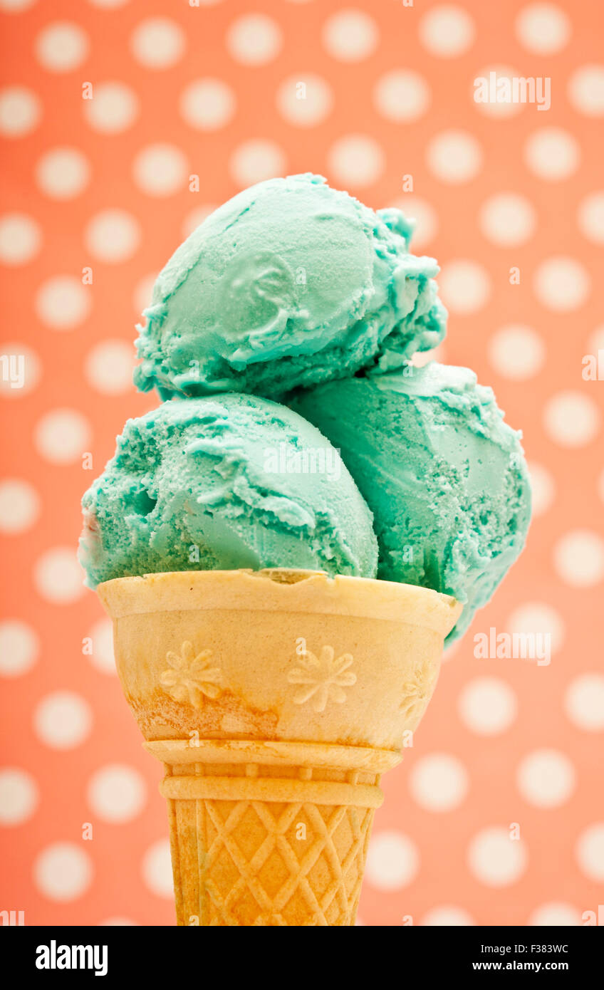 ice cream cone with scoops of Pistachio flavor Stock Photo