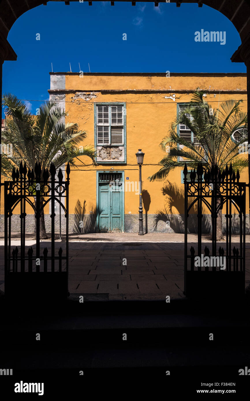 Old derelict building in Calle Padre Moore, in front of the Nuestra Senora de Concepcion church, Tenerife, Canary Islands, Spain Stock Photo