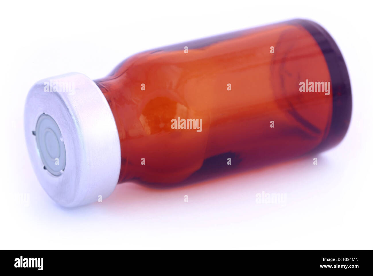 Brown vial over white background Stock Photo