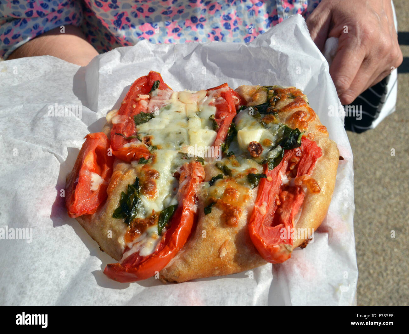 cheese pepper spinach flatbread on wrapper Stock Photo Alamy