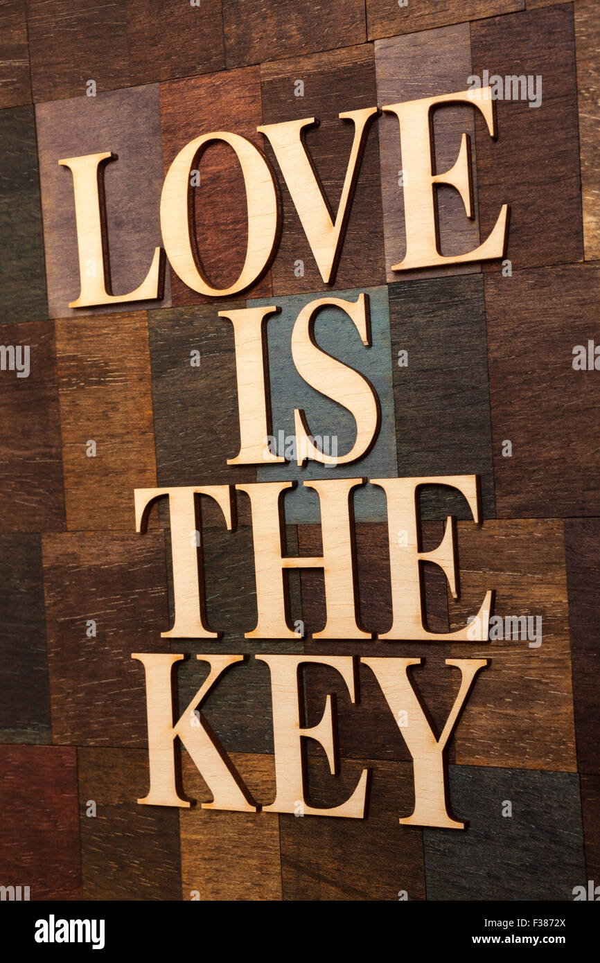 ''love is the key'' on wooden background Stock Photo