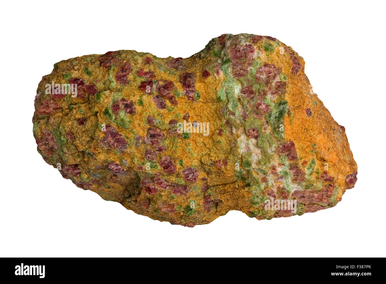 Peridotite (wehrlite) with yellow olivine, green chromian diopside and red pyrope (Mg-garnet) Stock Photo