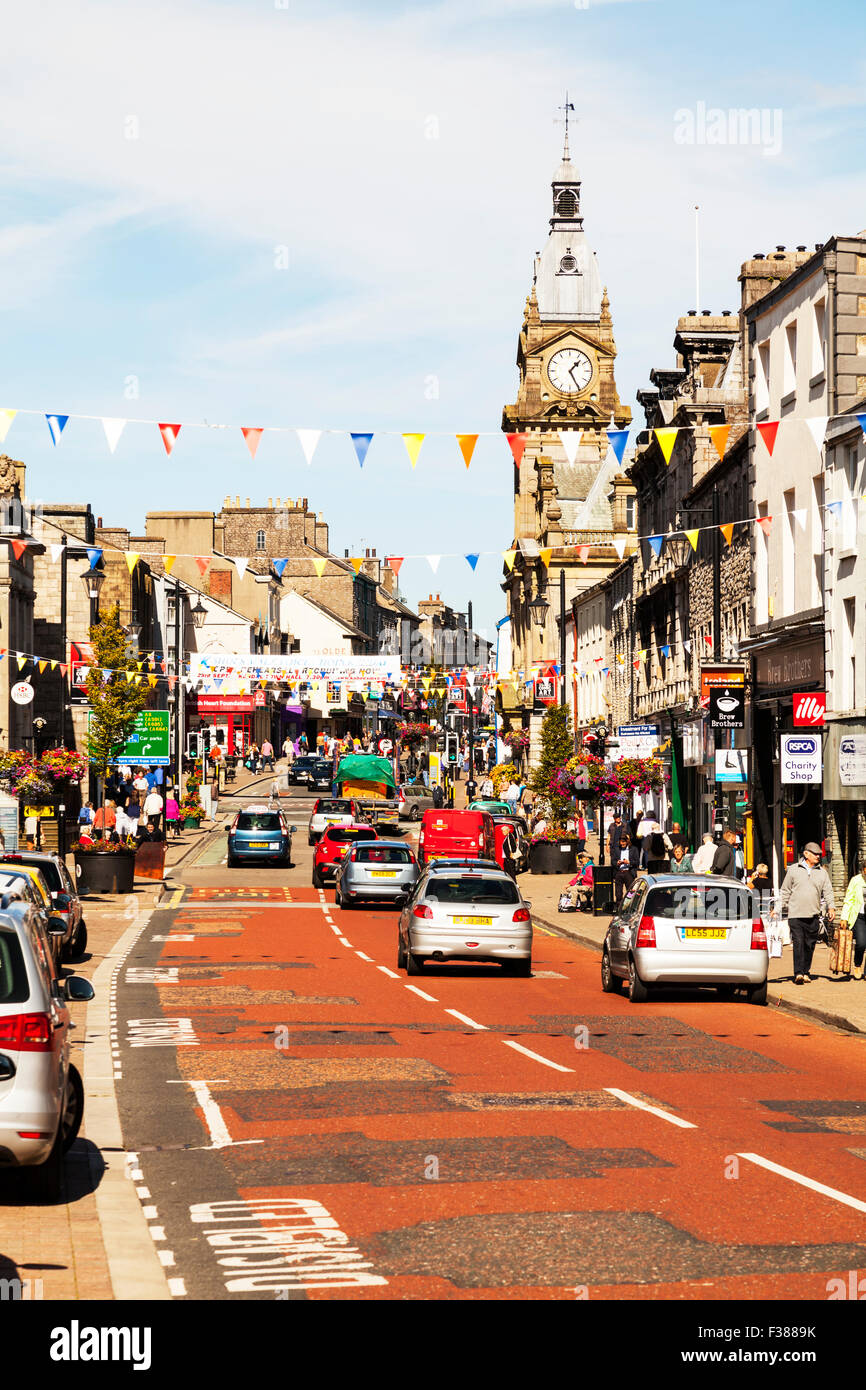Kendal Town, Cumbria, UK, England street shops and people shopping