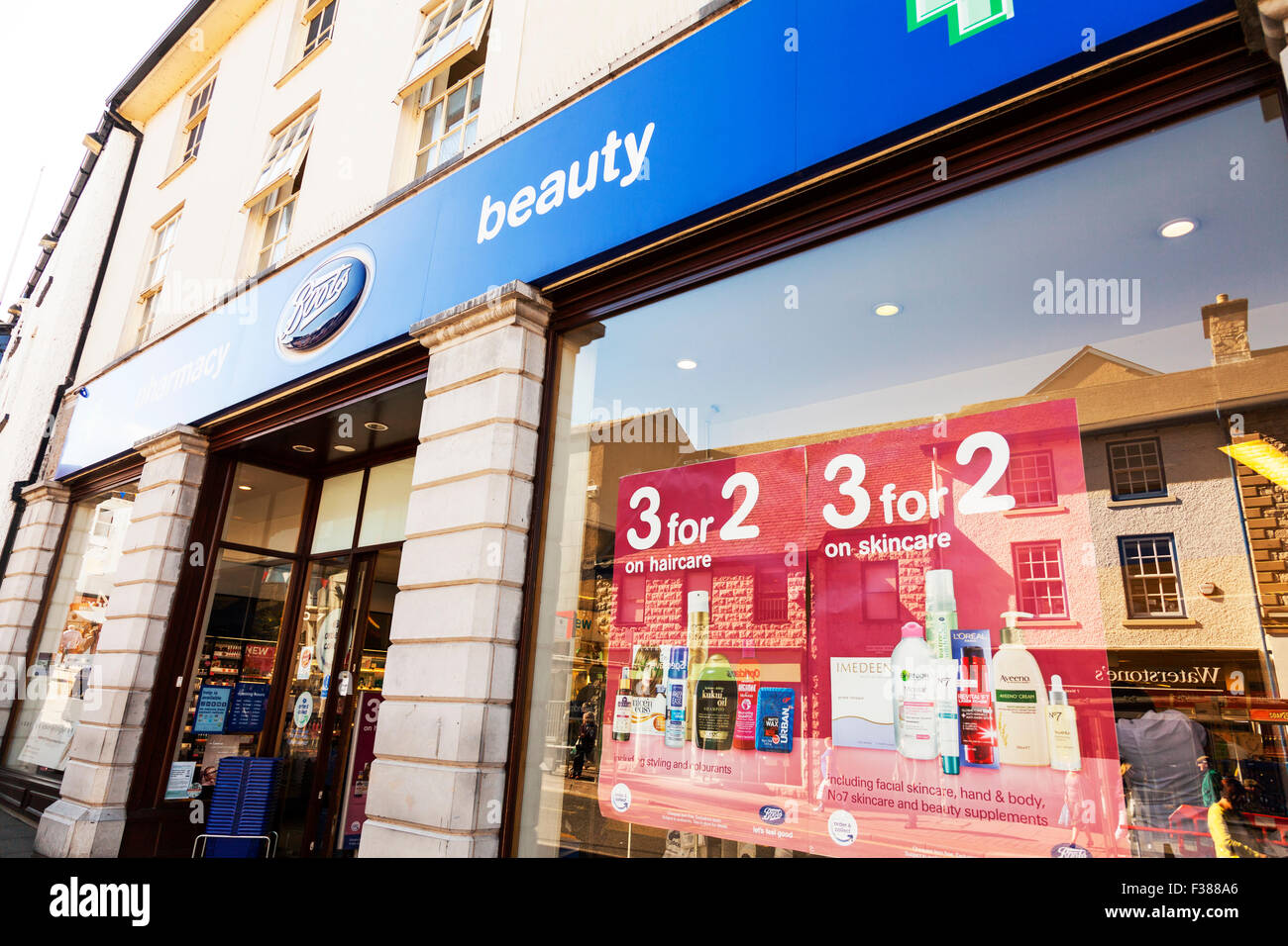 Boots chemist store beauty shop front sign exterior facade UK England high street shopping Kendal Cumbria UK Stock Photo