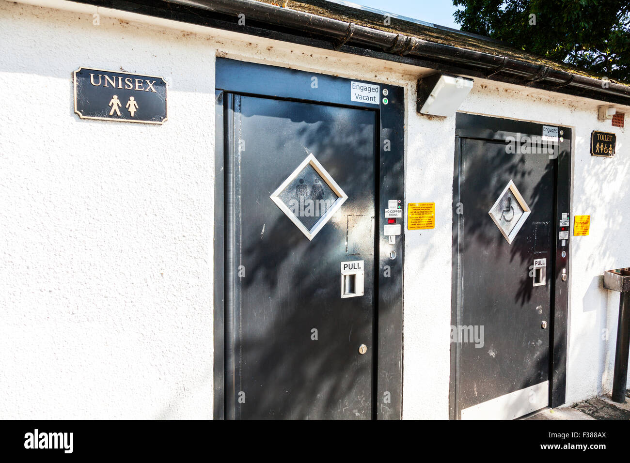 unisex toilet toilets pay payment needed to spend penny shared