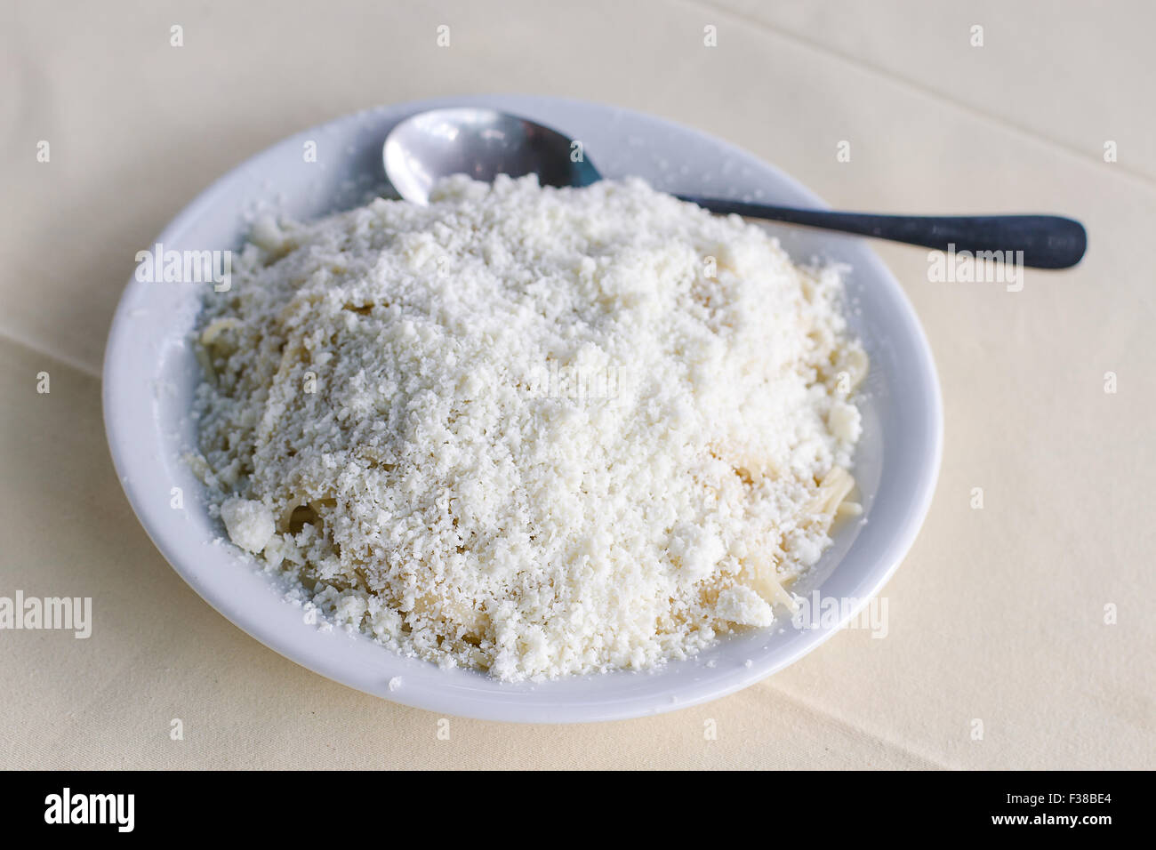 Cooked pasta with grated feta cheese, Greek Dining Stock Photo