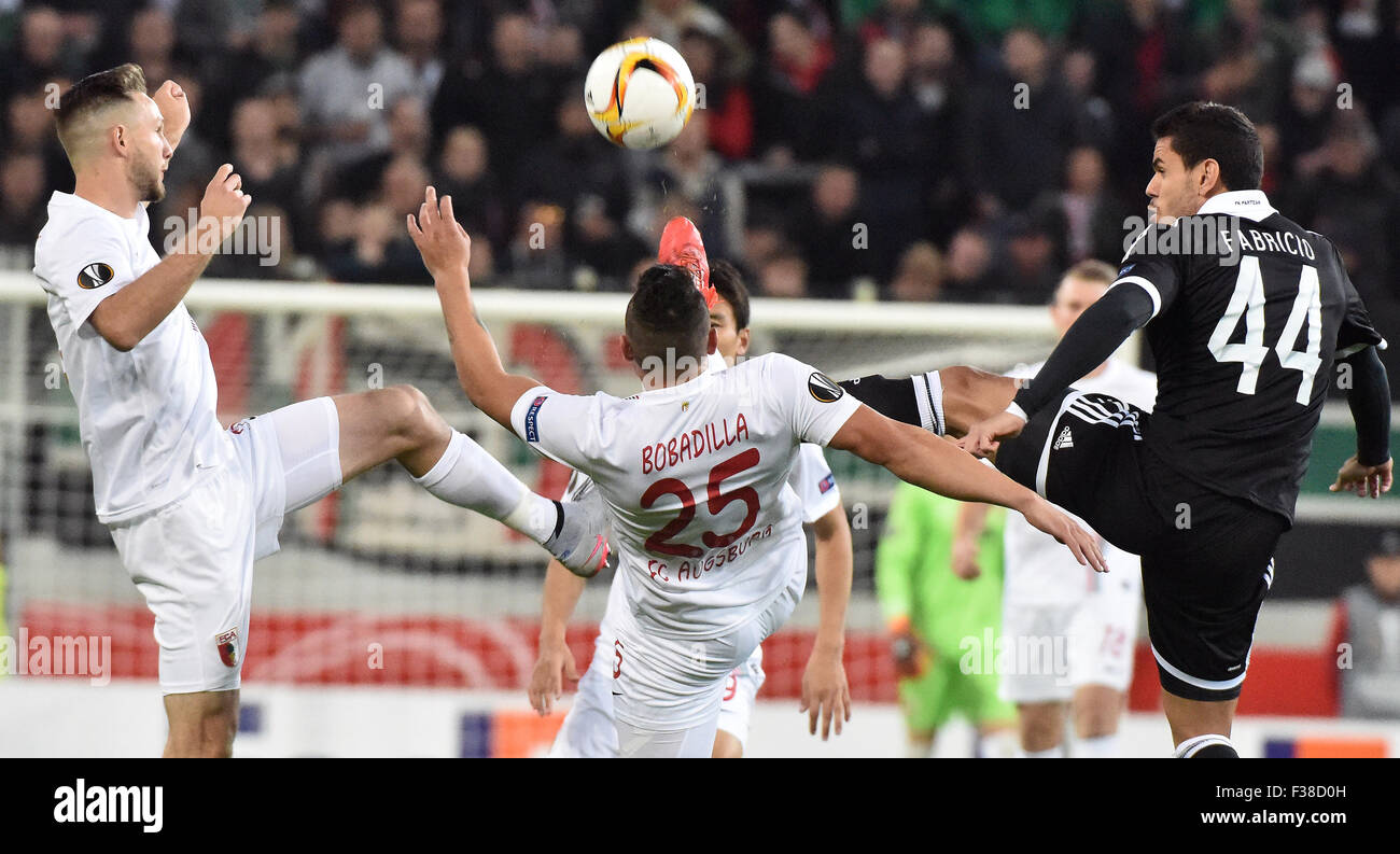 Augsburg, Germany. 1st Oct, 2015. Augsburg's Tim Matavz (l-r) and Raul Bobadilla compete for the ball with Belgrade's Fabricio (r) during the Europa League group L match between FC Augsburg and FK Partizan Belgrade, in Augsburg, Germany, 1 October 2015. PHOTO: STEFAN PUCHNER/DPA/Alamy Live News Stock Photo