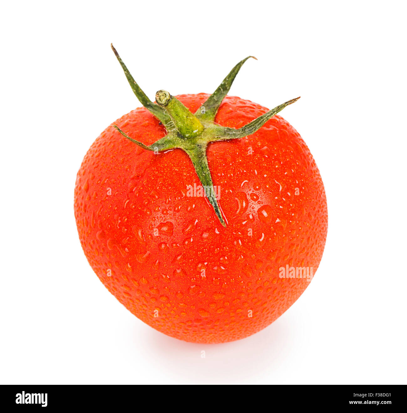 Red ripe tomato with drops isolated on white background Stock Photo - Alamy