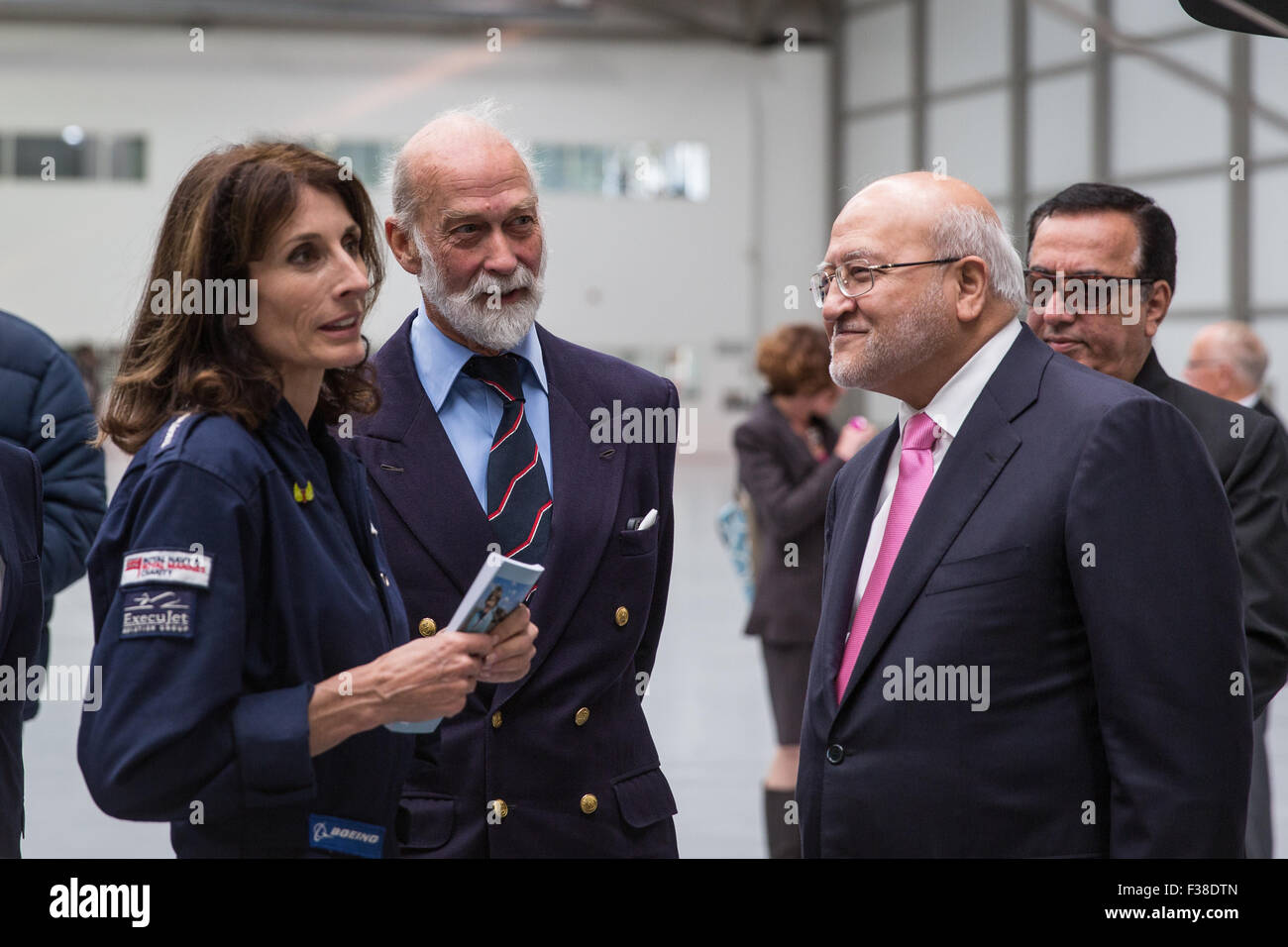 Farnborough Airport, UK. 1st October, 2015. Adventurer Tracey Curtis-Taylor starts 13,000 mile solo biplane flight.  Tracey Curtis Taylor talks to Prince Michael of Kent Credit:  carol moir/Alamy Live News Stock Photo
