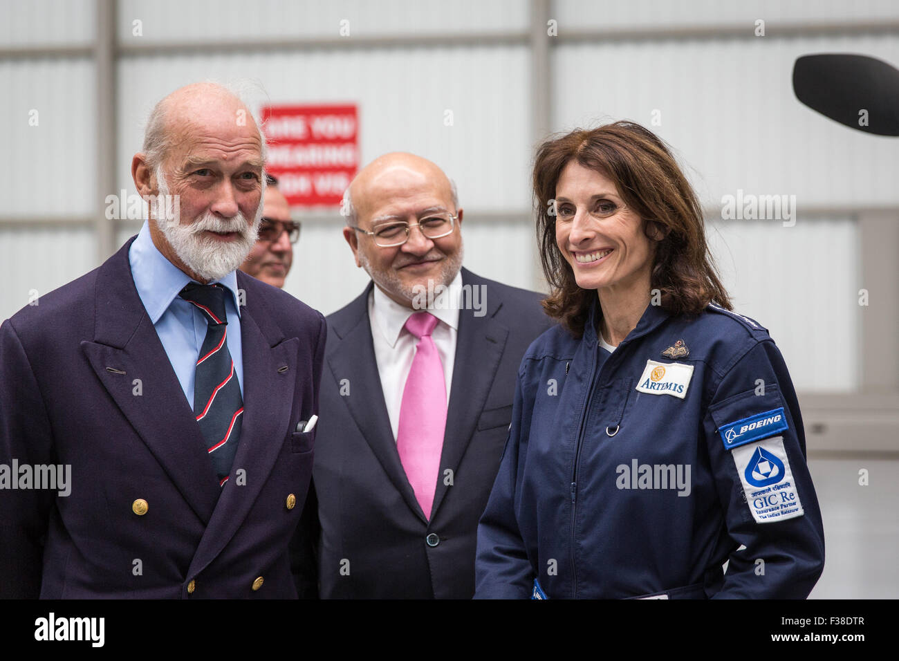 Farnborough Airport, UK. 1st October, 2015. Adventurer Tracey Curtis-Taylor starts 13,000 mile solo biplane flight.  Tracey Curtis Taylor talks to Prince Michael of Kent Credit:  carol moir/Alamy Live News Stock Photo