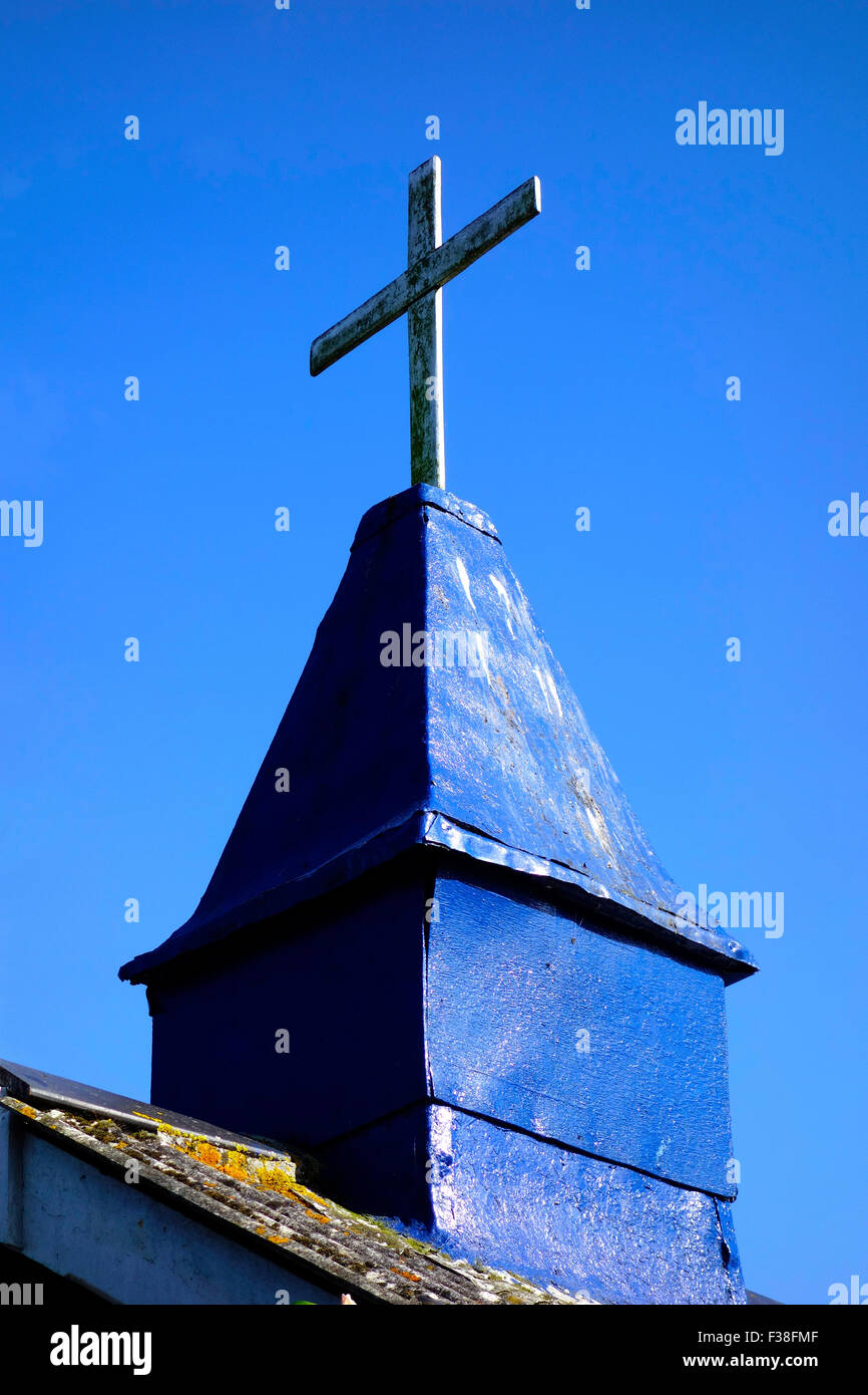 Cross and Steeple to St Marys Church, Cadgwith Village, Lizard Peninsula, Cornwall, England, UK Stock Photo