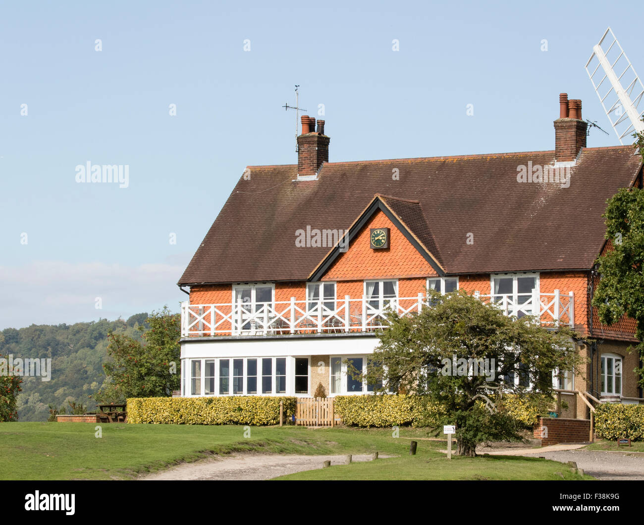 Reigate Heath golf course clubhouse and windmill Stock Photo