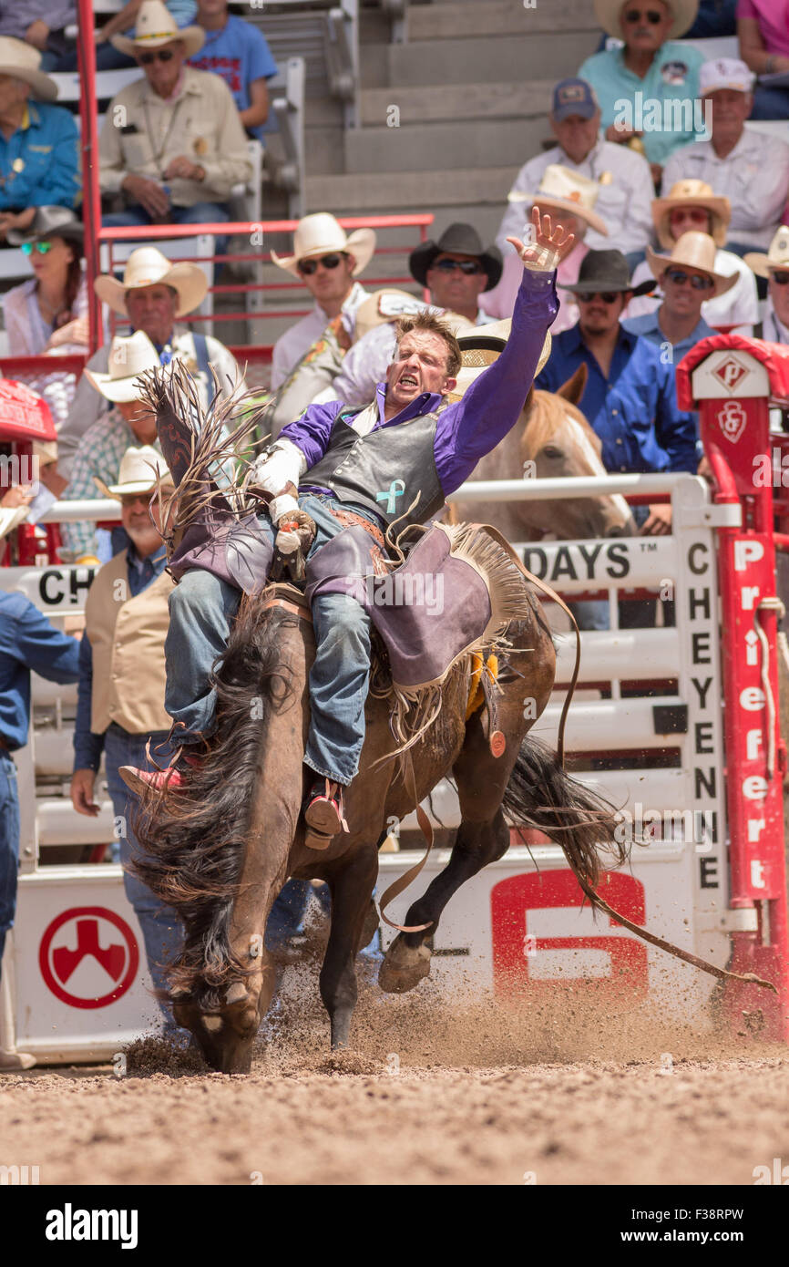 Bareback rider Tyler Scales of Severance, Colorado hangs on to Little