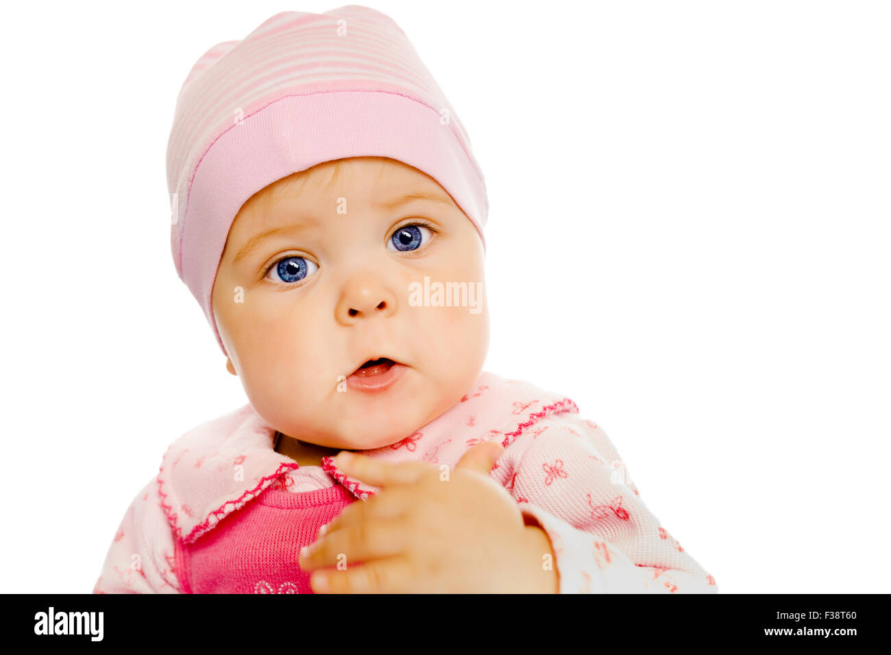 Cute baby girl in a pink dress and hat. Portrait. Studio. Isolated ...