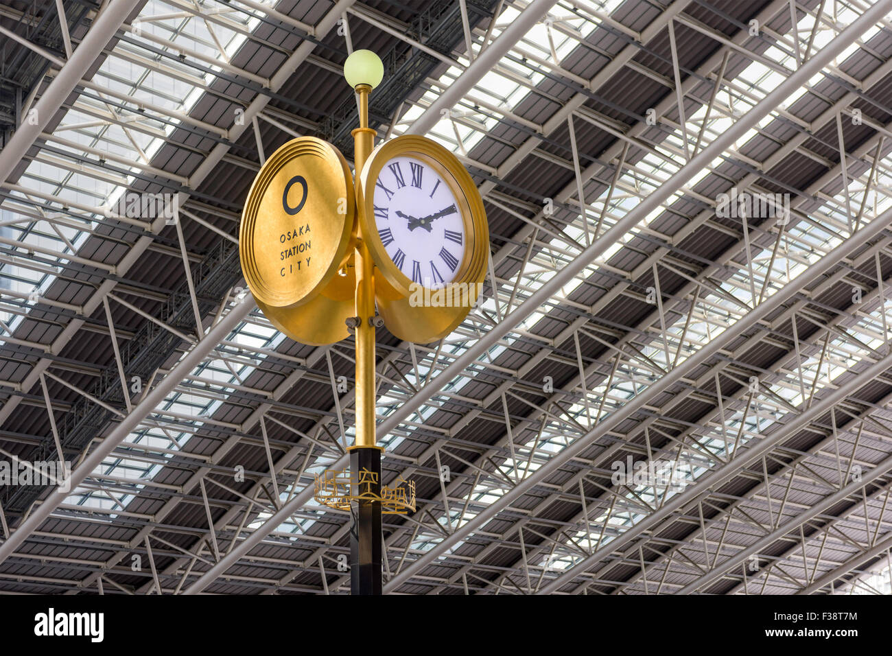 OSAKA, JAPAN - AUGUST 13, 2015: Clock in Osaka City Station's Sora no Hiroba plaza. Stock Photo
