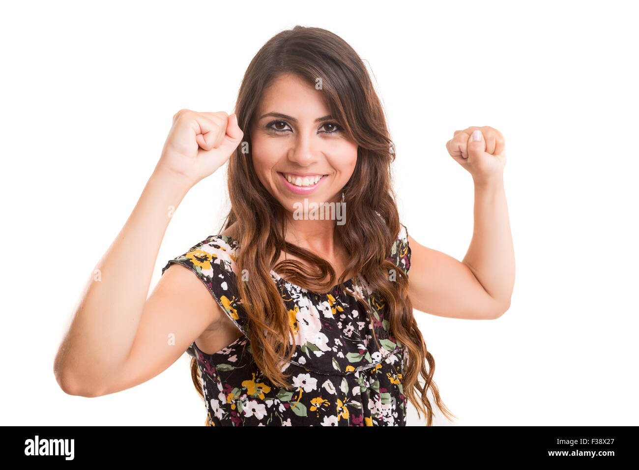 Studio shot: Happy woman with raised arms Stock Photo - Alamy