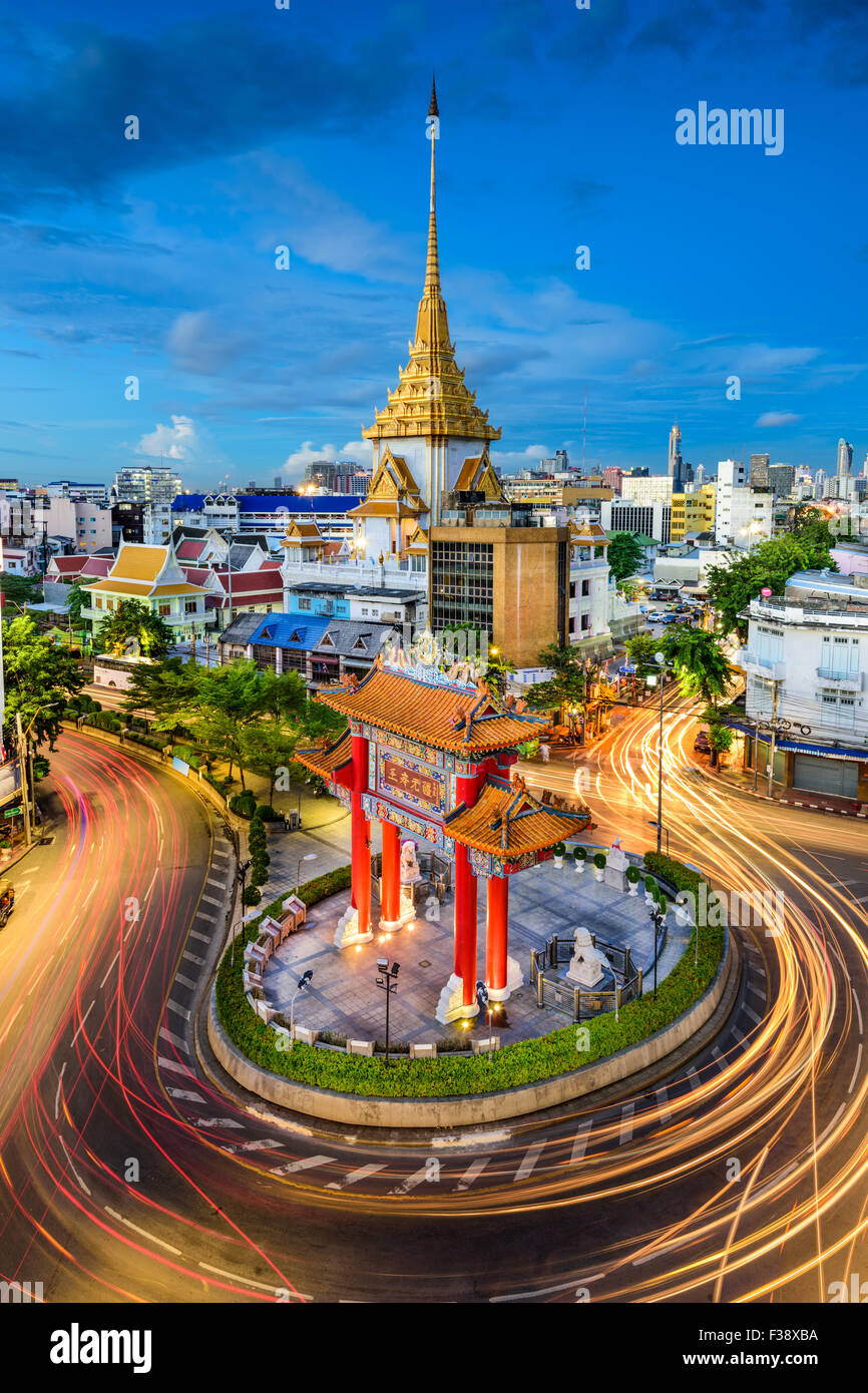 Bangkok, Thailand at Chinatown's traffic circle and Wat Traimit. Stock Photo