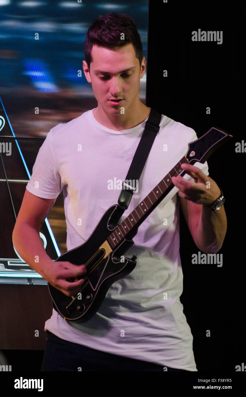 Sydney, Australia. 2nd October, 2015. Gamers play Guitar Hero Live at the 2015 EB Expo which took place at Syndey's Olympic Park Credit:  mjmediabox/Alamy Live News Stock Photo