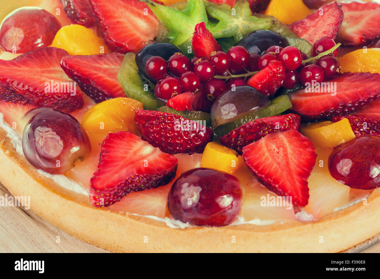 Pie with fruits and berries covered with jelly Stock Photo Alamy