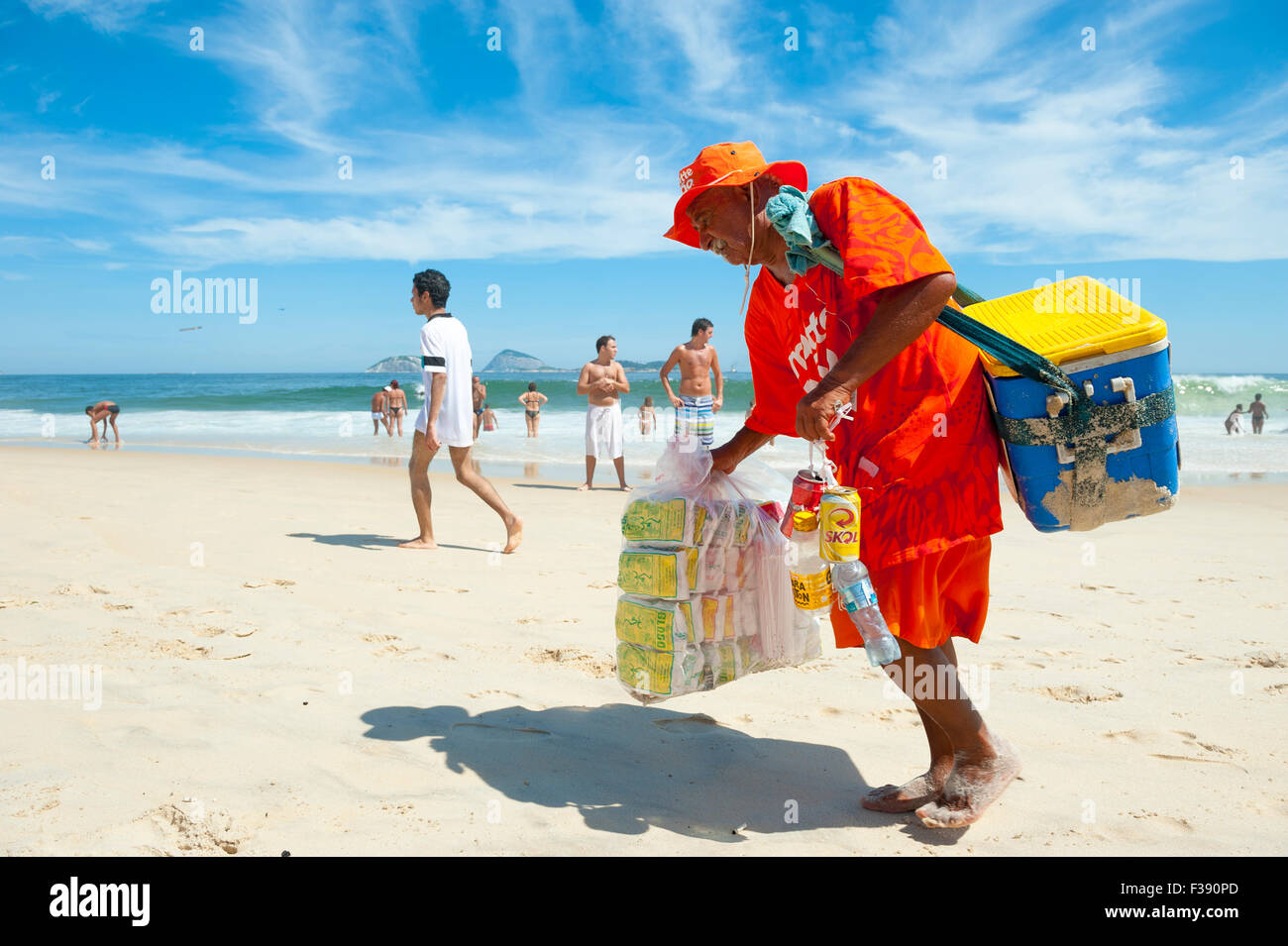 Rio De Janeiro Brazil January 24 14 Brazilian Beach Vendor Selling Snacks And Drinks Walks In Uniform Along Ipanema Stock Photo Alamy
