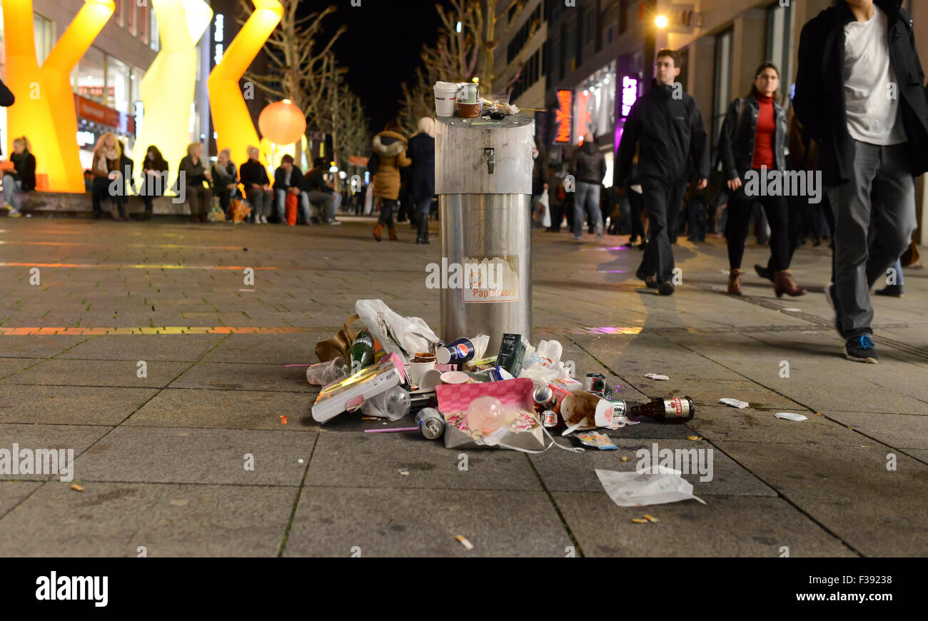 Overflowing trash can in a pedestrian zone, Stuttgart, Baden-Württemberg, Germany Stock Photo
