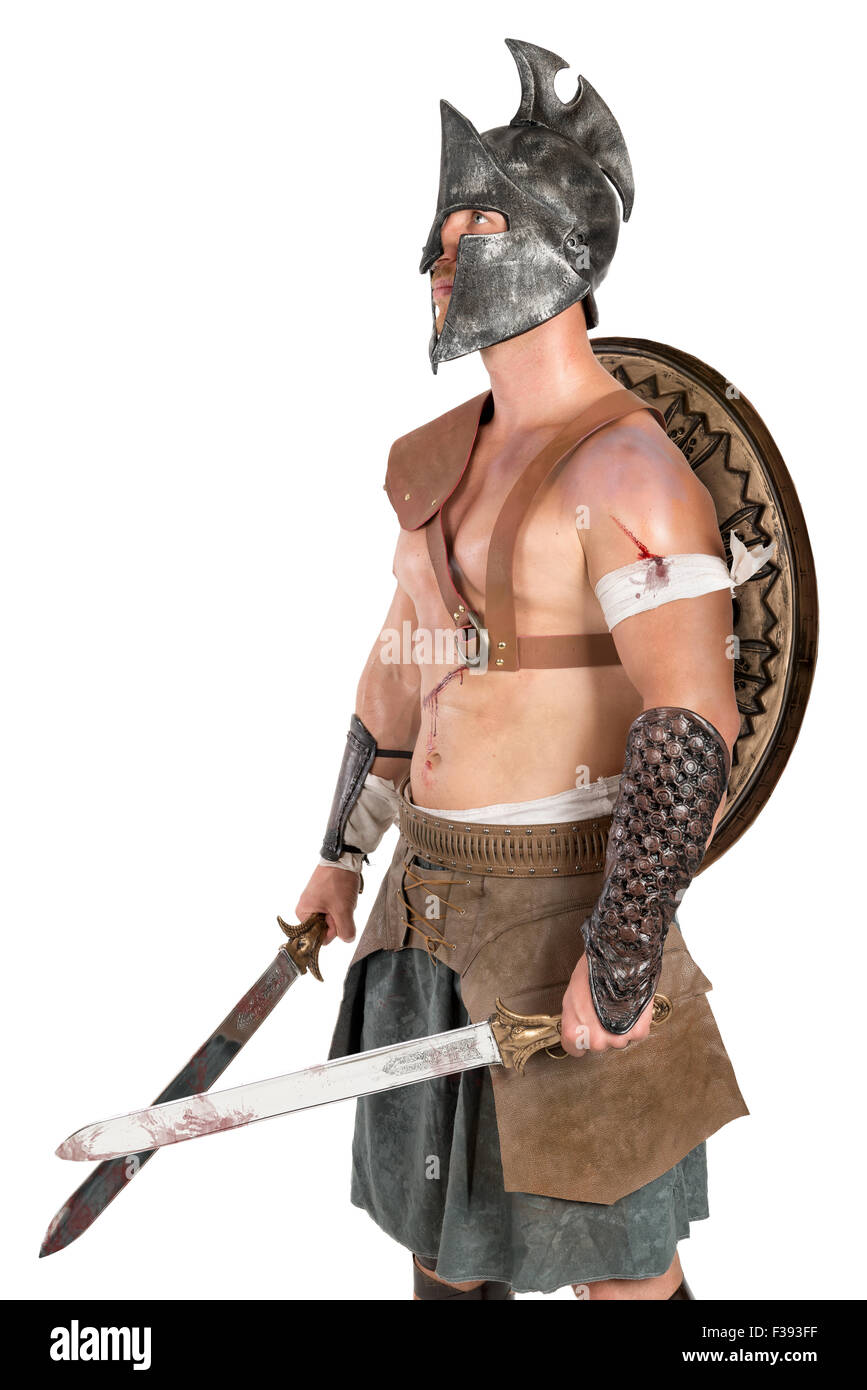 Gladiator posing isolated in a white background Stock Photo - Alamy