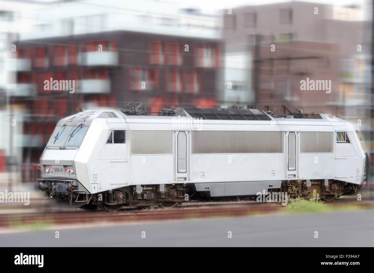 White vintage electrical train on a blurry background Stock Photo