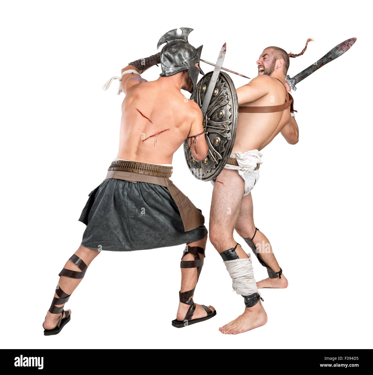 Gladiators fighting isolated in a white background Stock Photo
