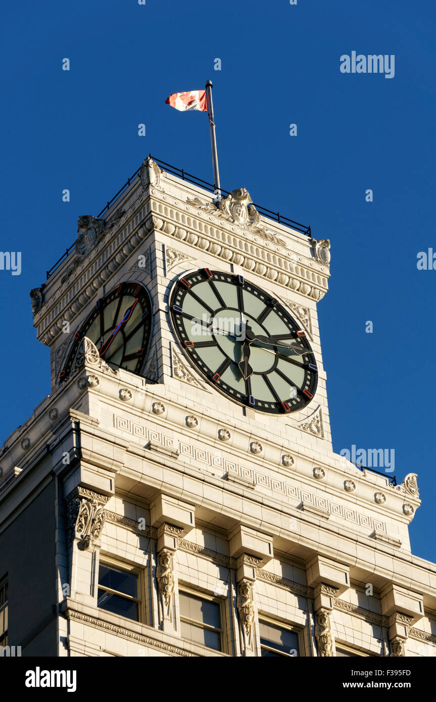 The Vancouver Block building neon clock tower on Granville Street in