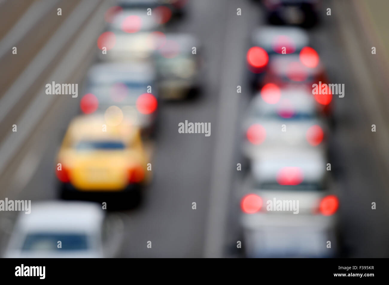 Blur shot of urban rush hour scene with multiple cars in a traffic congestion Stock Photo
