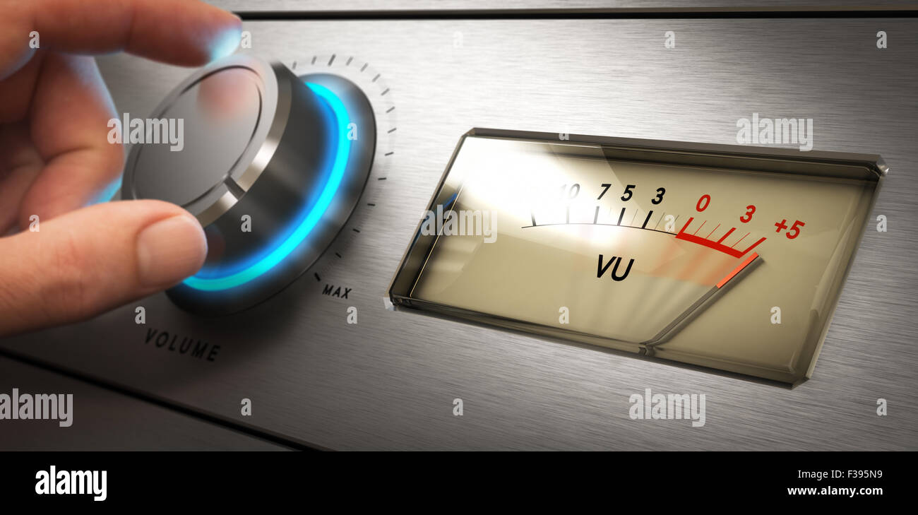 Hand turning the volume knob of an amplifier up to the maximum, Concept image for noisy environment or hearing problems Stock Photo