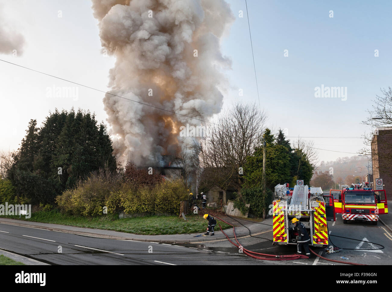 Teams from the Mid-Wales Fire and Rescue Service attend a fire in an ...