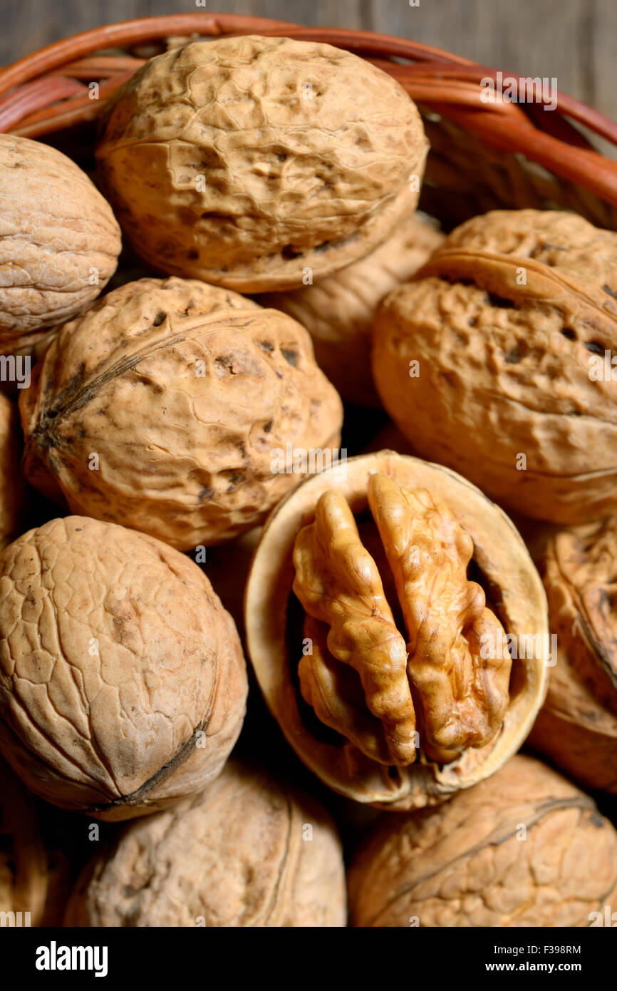 Macro dried walnuts in basket Stock Photo
