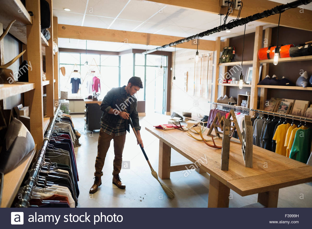 Broom Sweeping Floor Stock Photos & Broom Sweeping Floor Stock Images