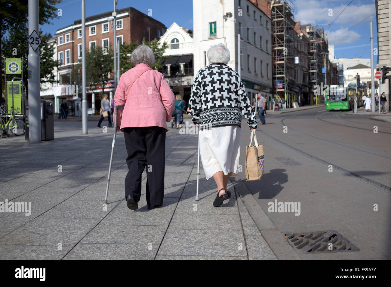 Disabled People Walking In City Centre Stock Photo - Alamy