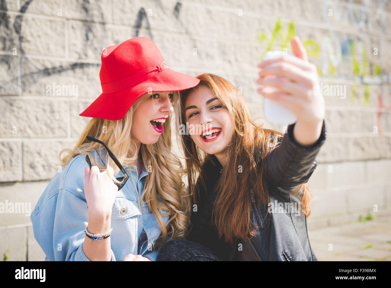 Beautiful stylish girl making selfie Stock Photo by ©dan.grytsku.gmail.com  124287138