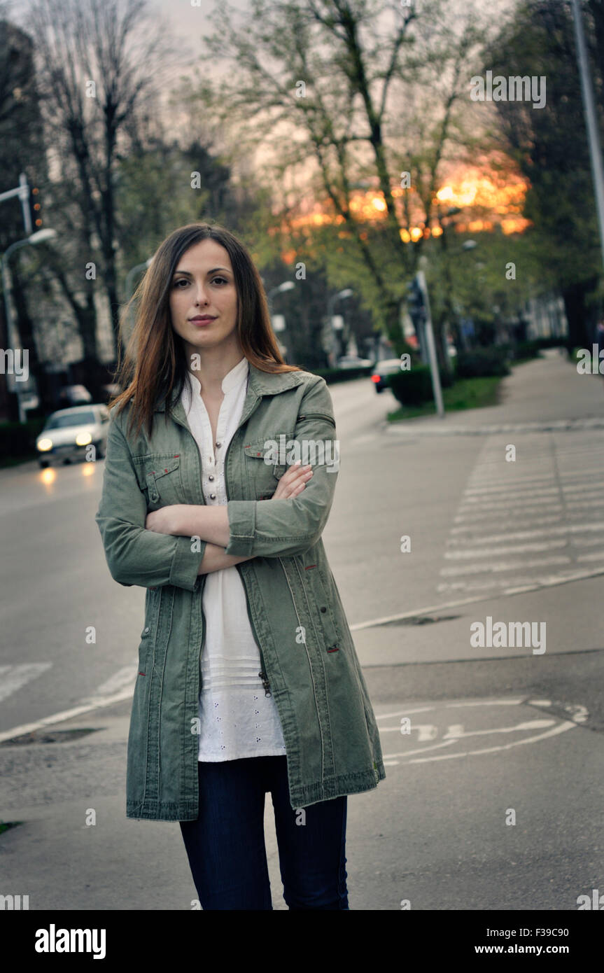 Portrait of a young urban woman on city street Stock Photo